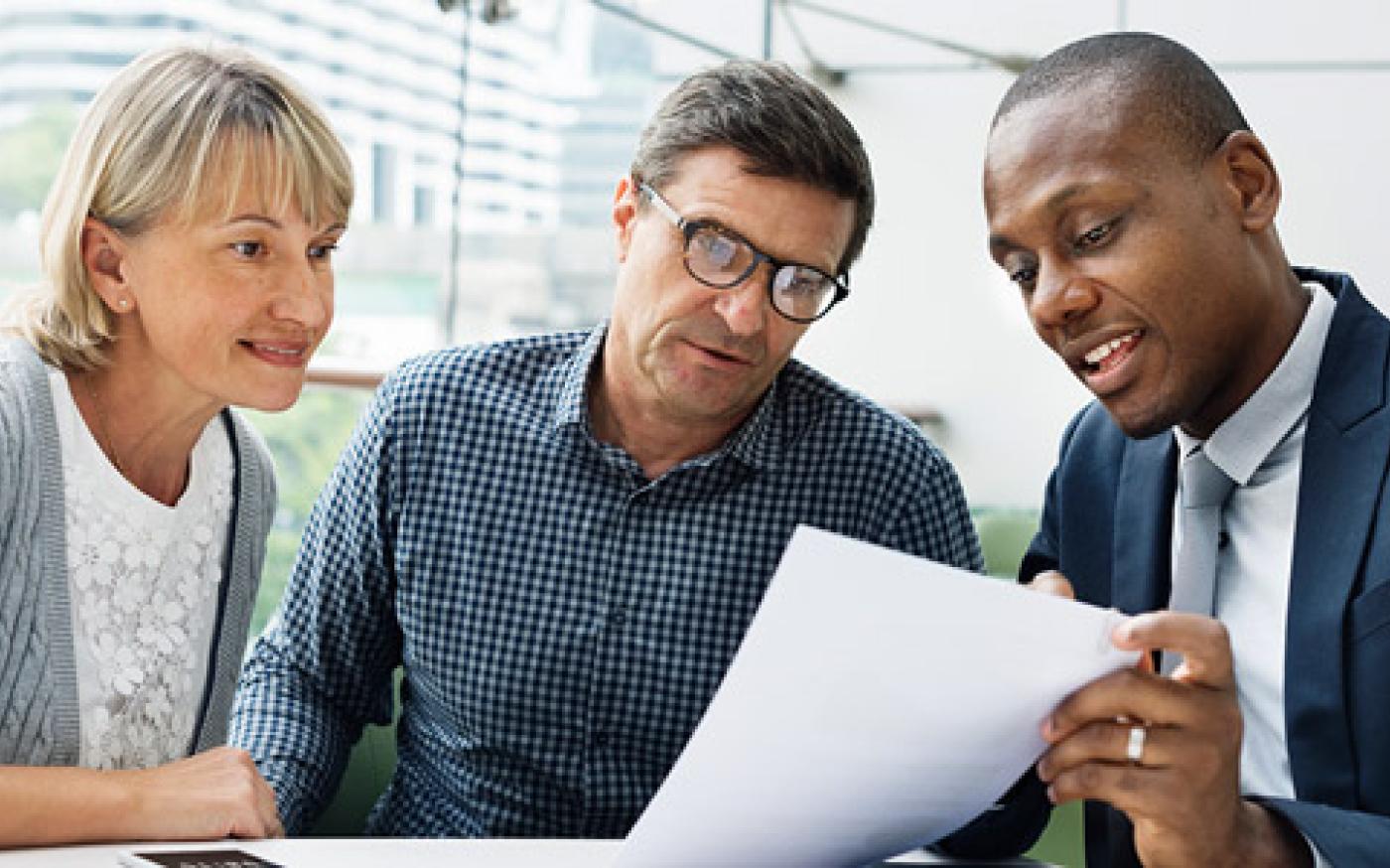 people reviewing documents